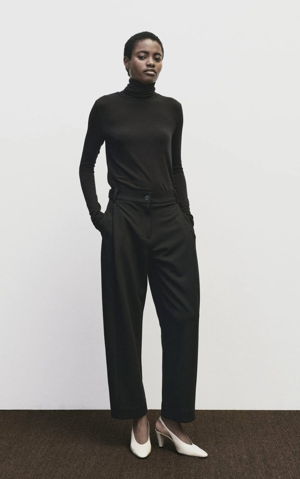 MIJEONG PARK ROLL NECK TOP IN BLACK