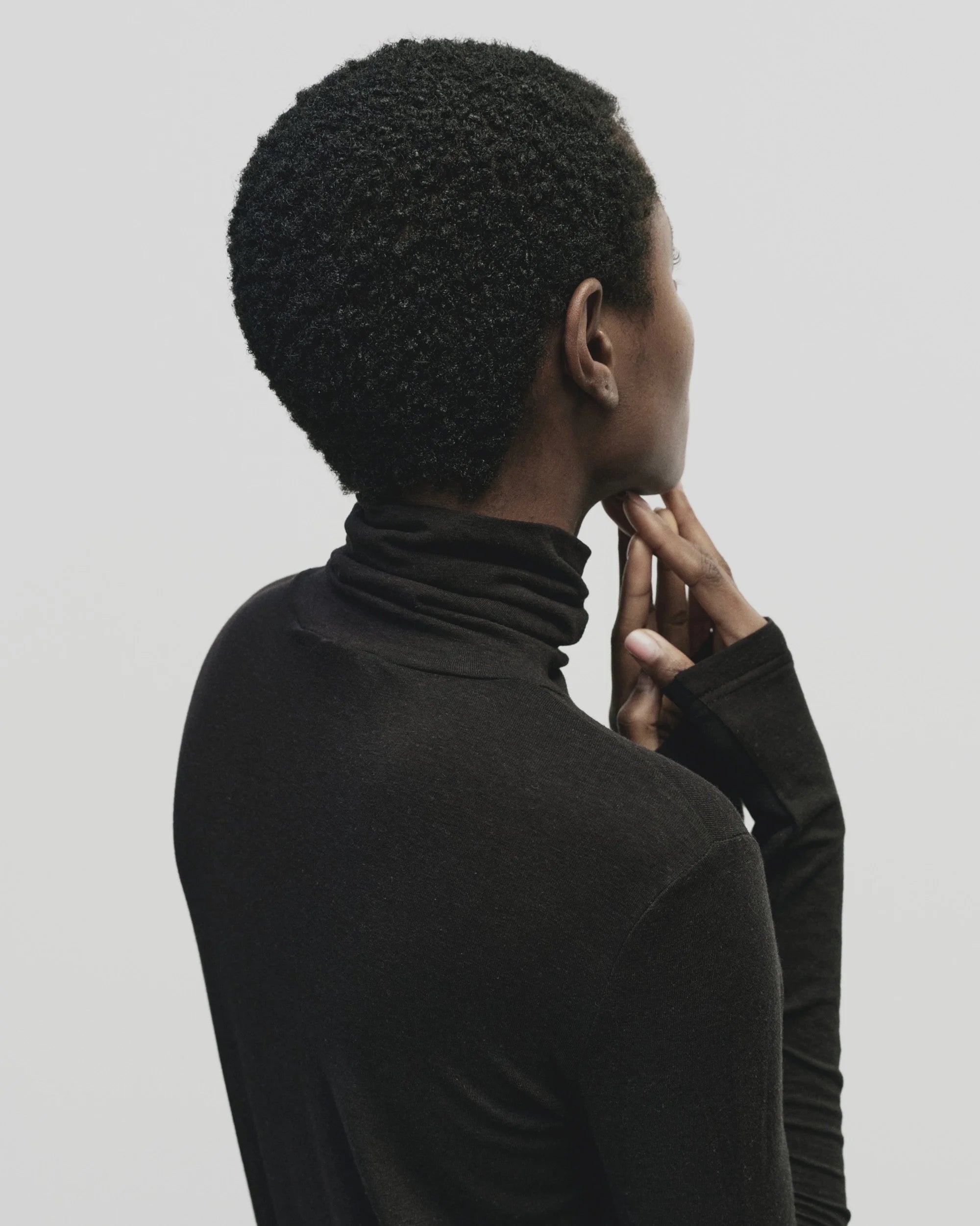 MIJEONG PARK ROLL NECK TOP IN BLACK