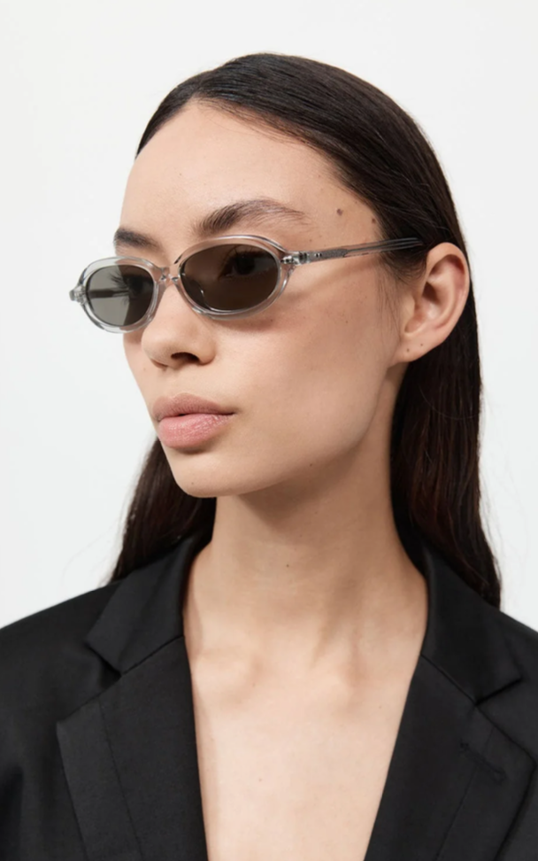 ST. AGNI SLIM OVAL SUNGLASSES IN SMOKE